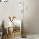 Lampadaire LED doré design avec lampes orientables blanches