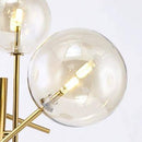 Lampadaire design LED doré avec branches et boules de verre Rotated