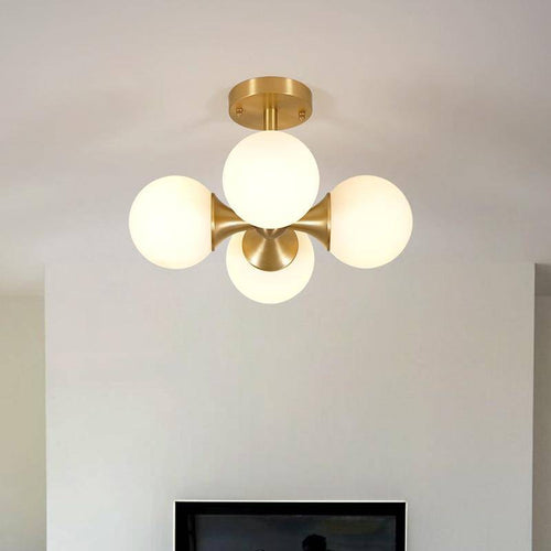 Plafonnier LED design doré avec boules en verre