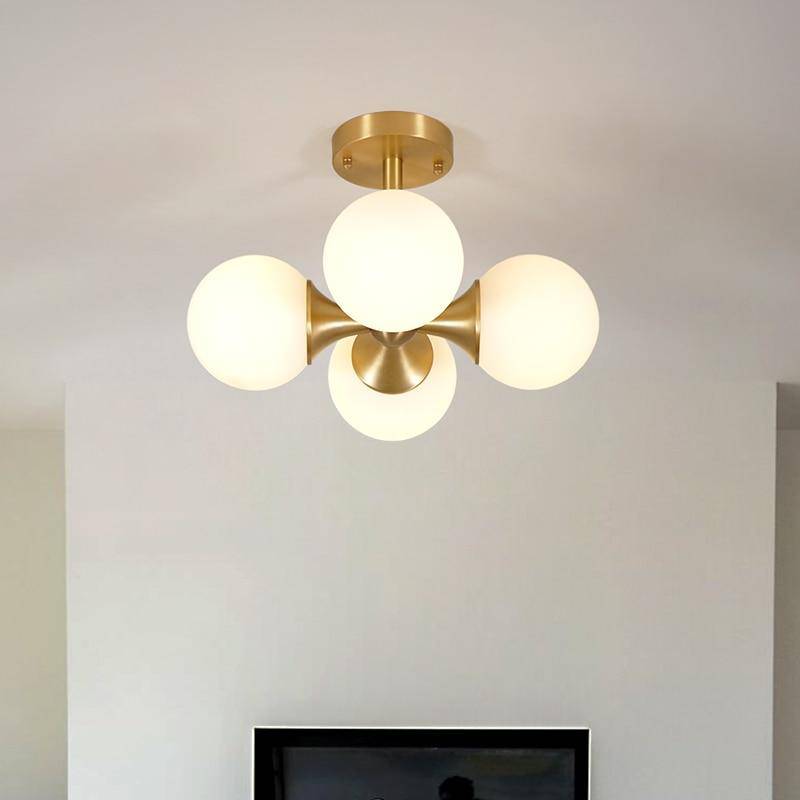 Plafonnier LED design doré avec boules en verre